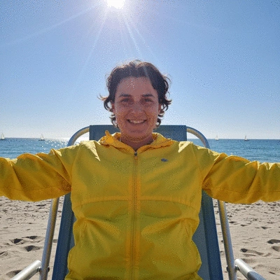 Person using a tablet to book a jet ski rental online, showing a booking interface with options and prices, clear blue water in background.